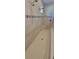 Walk-in shower with multiple shower heads and tiled walls at 3907 Golden Knot Dr, Kissimmee, FL 34746