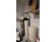Close-up of hot water tank and water filtration system at 3907 Golden Knot Dr, Kissimmee, FL 34746
