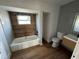 Modern bathroom featuring a shower-tub combo, and a vanity at 701 1St Ne St, Fort Meade, FL 33841
