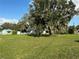 Large lot with mature oak tree and grassy area at 701 1St Ne St, Fort Meade, FL 33841