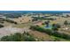 Aerial view showing large lot with pond at 8836 Sr 471 Hwy, Webster, FL 33597