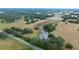 Aerial view of large lot with pond and trees at 8836 Sr 471 Hwy, Webster, FL 33597