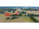 Aerial view of 17 acres with airstrip and pond at 8836 Sr 471 Hwy, Webster, FL 33597