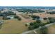 Aerial view of property near road and pond at 8836 Sr 471 Hwy, Webster, FL 33597
