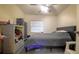 Simple bedroom with double bed and neutral decor at 8836 Sr 471 Hwy, Webster, FL 33597