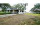 One-story house with stone facade and white picket fence at 8836 Sr 471 Hwy, Webster, FL 33597