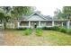Charming stone and wood cottage with white picket fence at 8836 Sr 471 Hwy, Webster, FL 33597