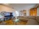 Cozy living room with sectional sofa, large TV and Gathering photos at 8836 Sr 471 Hwy, Webster, FL 33597