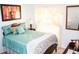Bright bedroom with tile floors featuring a well-lit window and comfortable bed at 1053 Hemingway Dr, Deltona, FL 32725