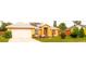 Charming single-story home with well-maintained landscaping and solar panels, enhancing curb appeal at 1053 Hemingway Dr, Deltona, FL 32725
