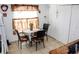 Cozy eat in kitchen featuring a breakfast nook with tile floors and natural light at 1053 Hemingway Dr, Deltona, FL 32725