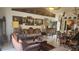 Spacious living room featuring antique furniture and decorative artwork at 1053 Hemingway Dr, Deltona, FL 32725