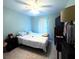 Serene bedroom with a comfortable bed, soft lighting, and neutral decor creating a relaxing space at 2112 Fish Eagle St, Clermont, FL 34714