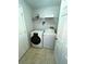 Bright laundry room equipped with modern washer and dryer at 2112 Fish Eagle St, Clermont, FL 34714