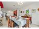 Open-concept dining area connecting to the kitchen, ideal for entertaining guests at 3878 Carrick Bend Dr, Kissimmee, FL 34746