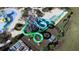 Aerial view of a vibrant water park featuring thrilling water slides and a splash pad area at 712 Whistling Straits Blvd, Davenport, FL 33896