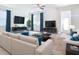Bright and spacious living room with modern furnishings and decor at 11720 Language Way, Orlando, FL 32832
