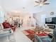 Open-concept living area featuring tile floors and modern decor at 11720 Language Way, Orlando, FL 32832