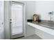 Mud room featuring door to outside, jukebox and counter at 11720 Language Way, Orlando, FL 32832