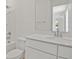 Bright bathroom featuring a white vanity with quartz countertop, shower-tub combo, and modern fixtures at 3716 Deer Ridge Dr, Mount Dora, FL 32757