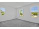 Bedroom features neutral carpet, a large window, recessed lighting, and neutral paint at 3716 Deer Ridge Dr, Mount Dora, FL 32757