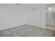 Neutral bedroom with carpet, closet, and access to ensuite bathroom; offering a serene and functional space at 3716 Deer Ridge Dr, Mount Dora, FL 32757