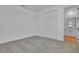 Bedroom with neutral carpet and closet featuring access to the en-suite bath at 3764 Deer Ridge Dr, Mount Dora, FL 32757