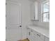 Cozy room with white cabinets and countertops, offering flexibility as a bedroom, office, or creative studio space at 3764 Deer Ridge Dr, Mount Dora, FL 32757