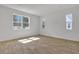 Bright, airy room with neutral floors, offering flexibility as a bedroom, office, or creative studio space at 3764 Deer Ridge Dr, Mount Dora, FL 32757