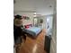 Comfortable bedroom featuring wood floors, ample closet space, and lots of light at 824 San Pedro Ct, Kissimmee, FL 34758