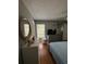 Bright bedroom features wood floors, a large window, and neutral paint tones at 824 San Pedro Ct, Kissimmee, FL 34758