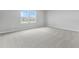 Spacious bedroom with carpet, natural light, and great views at 1455 August Gray Dr, Kissimmee, FL 34744