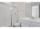 Clean bathroom with shower, toilet and vanity with white cabinets at 1461 August Gray Dr, Kissimmee, FL 34744