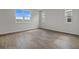 Spacious bedroom with large windows and neutral carpeting at 1461 August Gray Dr, Kissimmee, FL 34744