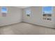 Bright bedroom with neutral wall and carpeting, three windows at 1461 August Gray Dr, Kissimmee, FL 34744