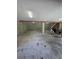 Large unfinished basement with concrete block walls, support beams and concrete floors at 2728 Adair Rd, Davenport, FL 33837