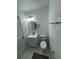 Bathroom featuring a vanity with sink and toilet, complemented by a mirror and modern fixtures at 2728 Adair Rd, Davenport, FL 33837
