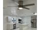 Updated kitchen featuring stainless steel appliances and modern lighting at 2728 Adair Rd, Davenport, FL 33837