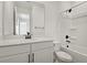 Well-lit bathroom featuring a modern vanity with quartz countertop and sleek black fixtures at 3724 Deer Ridge Dr, Mount Dora, FL 32757