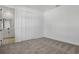 Bright bedroom features neutral carpet, closet, and an ensuite bathroom for added convenience at 3724 Deer Ridge Dr, Mount Dora, FL 32757