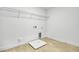Spacious laundry room includes tile floors, washer/dryer hookups, and plenty of room for storage at 3724 Deer Ridge Dr, Mount Dora, FL 32757