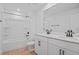 Bright bathroom featuring double vanity, bathtub, and shower combo at 3732 Deer Ridge Dr, Mount Dora, FL 32757