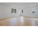 Open living room featuring neutral walls, tile floor, recessed lights, and large windows at 3732 Deer Ridge Dr, Mount Dora, FL 32757