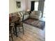 Cozy living room featuring modern furnishings, hardwood floors, and plenty of natural light at 7510 Seven Eagles Way # 7510, Reunion, FL 34747