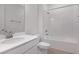 Clean bathroom with a tub, shower, and a white vanity at 652 Hennepin Loop, Lake Wales, FL 33898