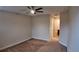 Bedroom features a ceiling fan and neutral wall paint at 1222 Castlevecchio Loop, Orlando, FL 32825