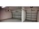 Spacious two-car garage with doors and automatic opener at 1222 Castlevecchio Loop, Orlando, FL 32825