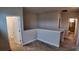 Upstairs hallway featuring neutral paint, carpeting, and white trim at 1222 Castlevecchio Loop, Orlando, FL 32825