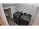 Laundry room featuring modern washer and dryer units at 1222 Castlevecchio Loop, Orlando, FL 32825
