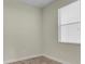 Neutral bedroom featuring wood floors and a window offering lots of natural light at 1569 Thetford Cir, Orlando, FL 32824